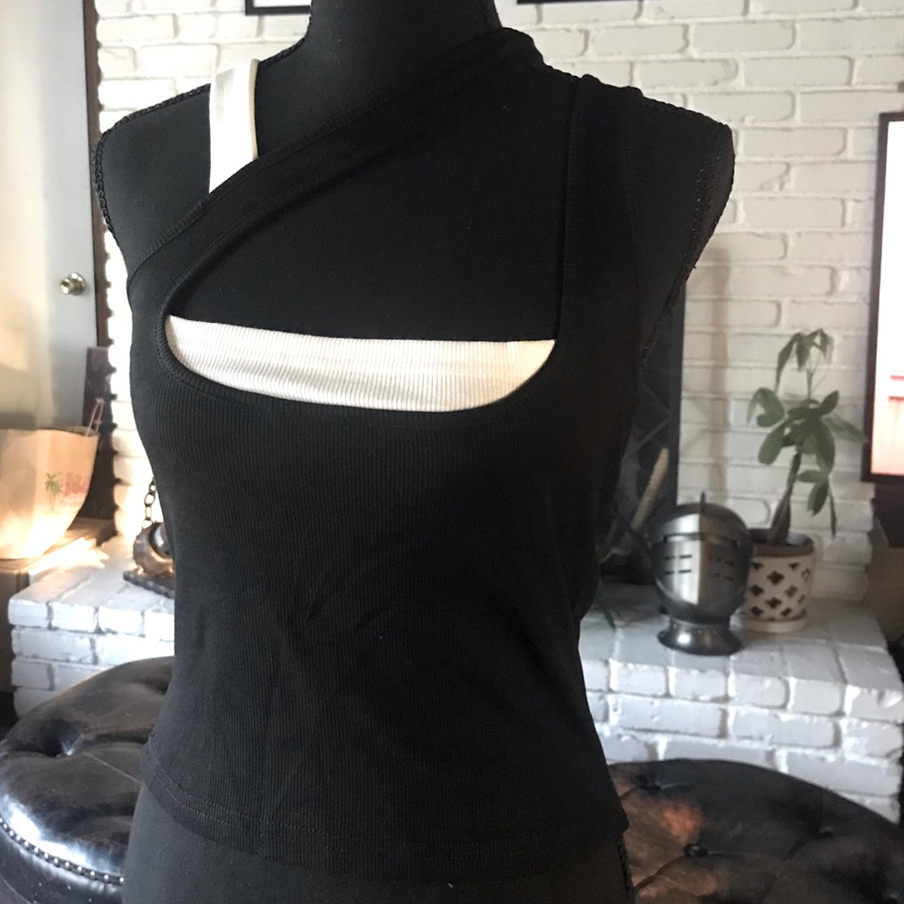 Asymmetrical black and white tank.